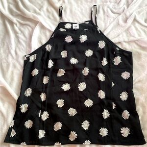 Cabo - Sleeveless. Black with white flowers